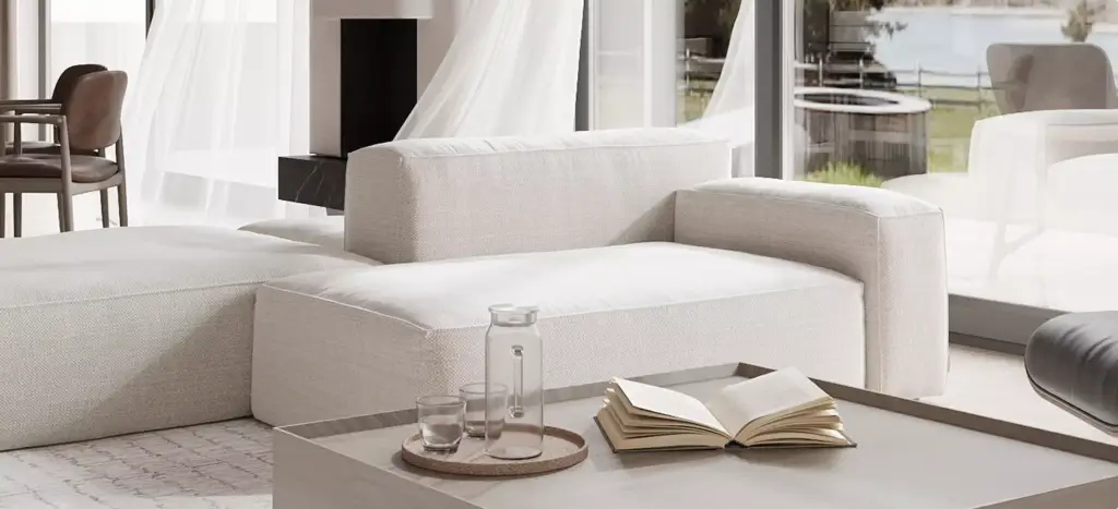 Office render of a bright lounge with white sofa, coffee table, open book, and sheer curtains