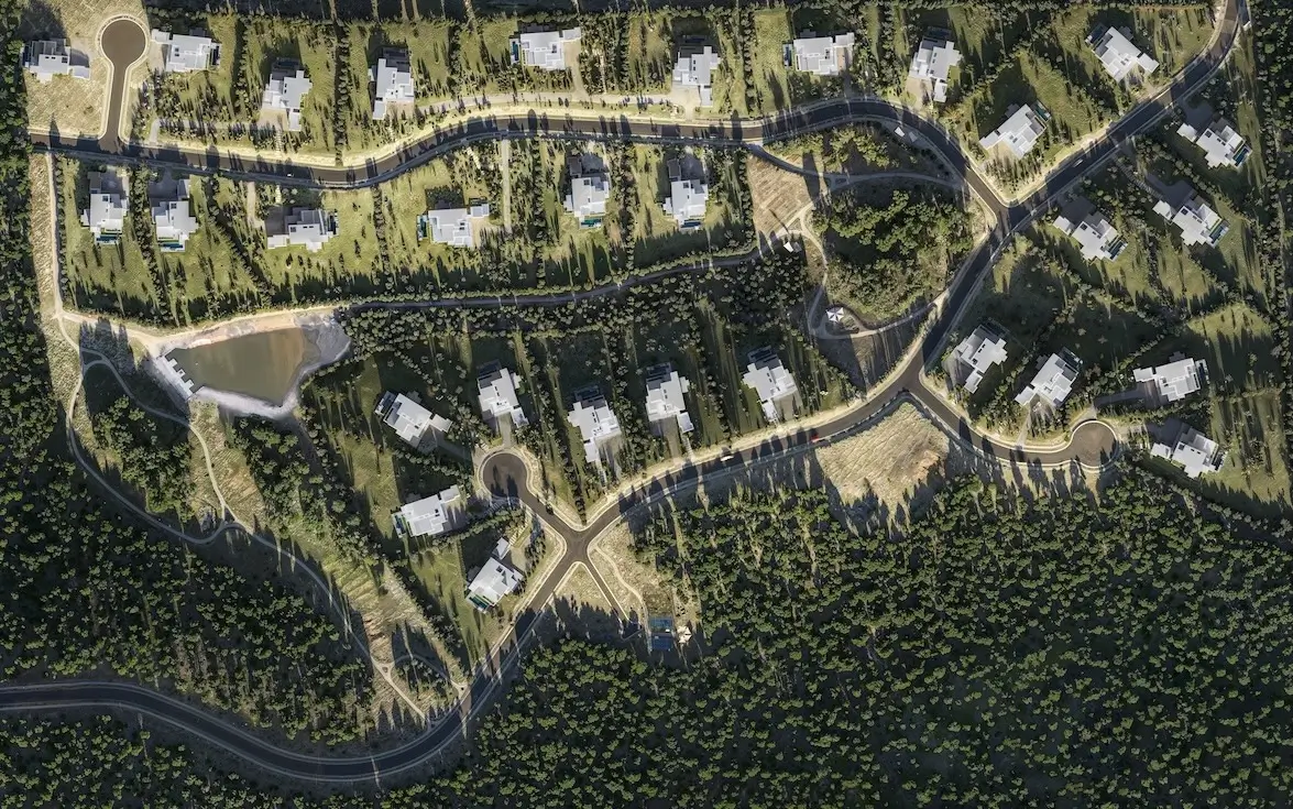 3D Rendering Pricing Guide: How Much Do 3D Renderings Cost in 2026 Aerial site plan of a residential community in forest, architectural rendering costs overview
