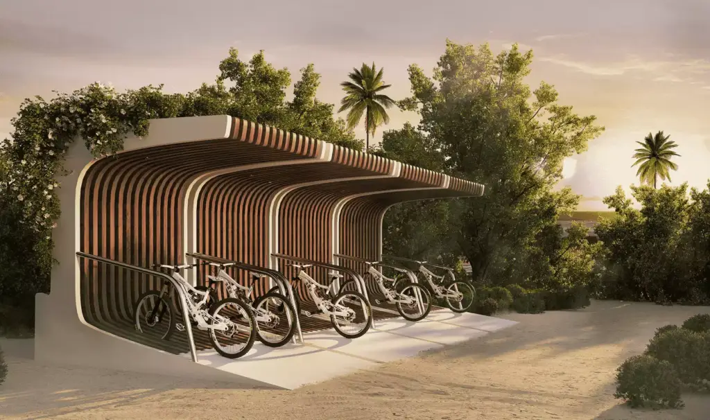 Bicycle parking in 3D rendering for hotel marketing shows a wood shelter, bikes, trees, and sandy path
