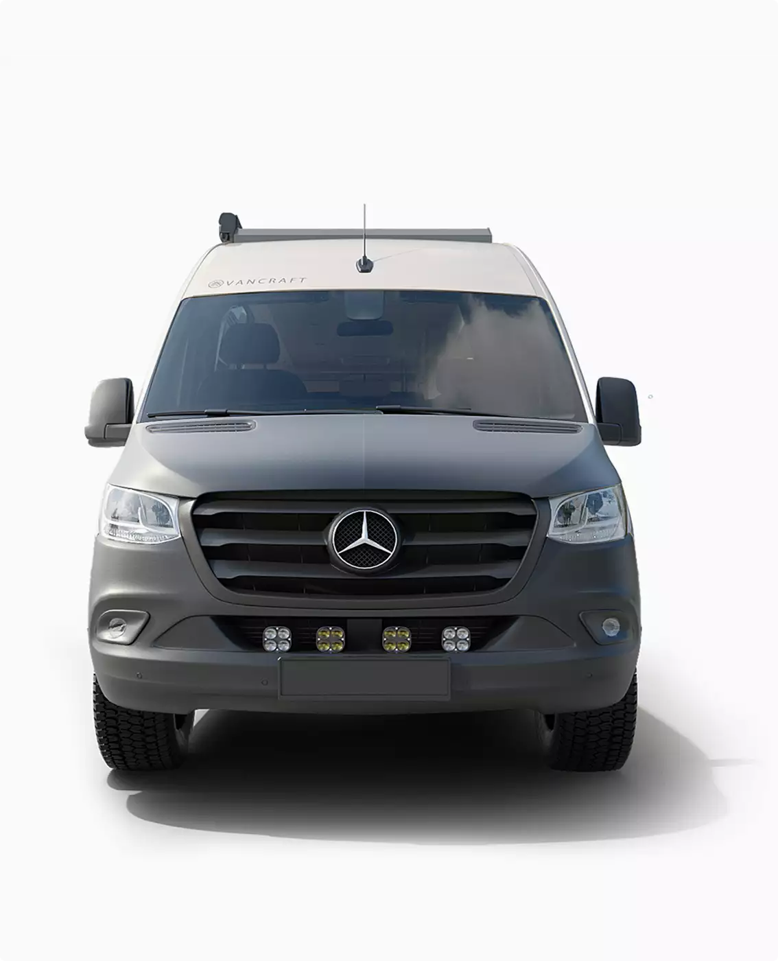 campervan exterior front view with grille, headlights, roof awning and off road tires