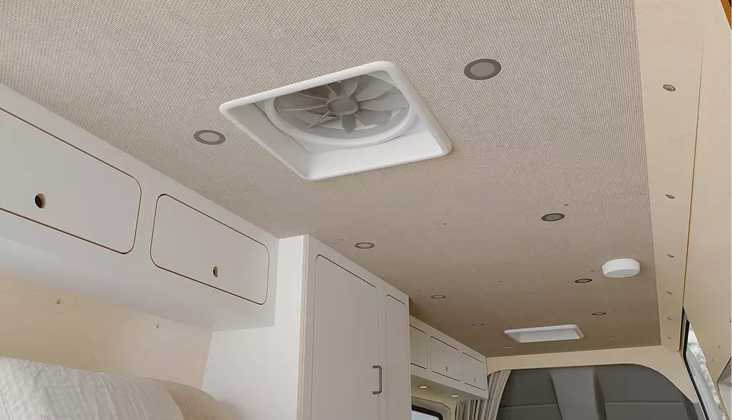 campervan interior ideas ceiling with roof vent fan, recessed lights and overhead cabinets