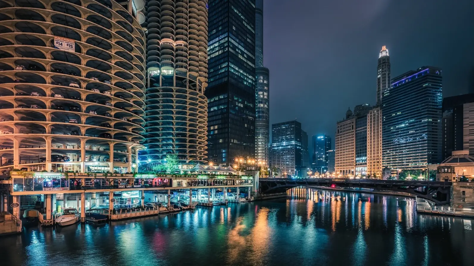 3D Rendering Chicago for Faster Approvals and Better Project Communication Riverfront towers at night, chicago 3D rendering look with reflections, bridge, and marina buildings