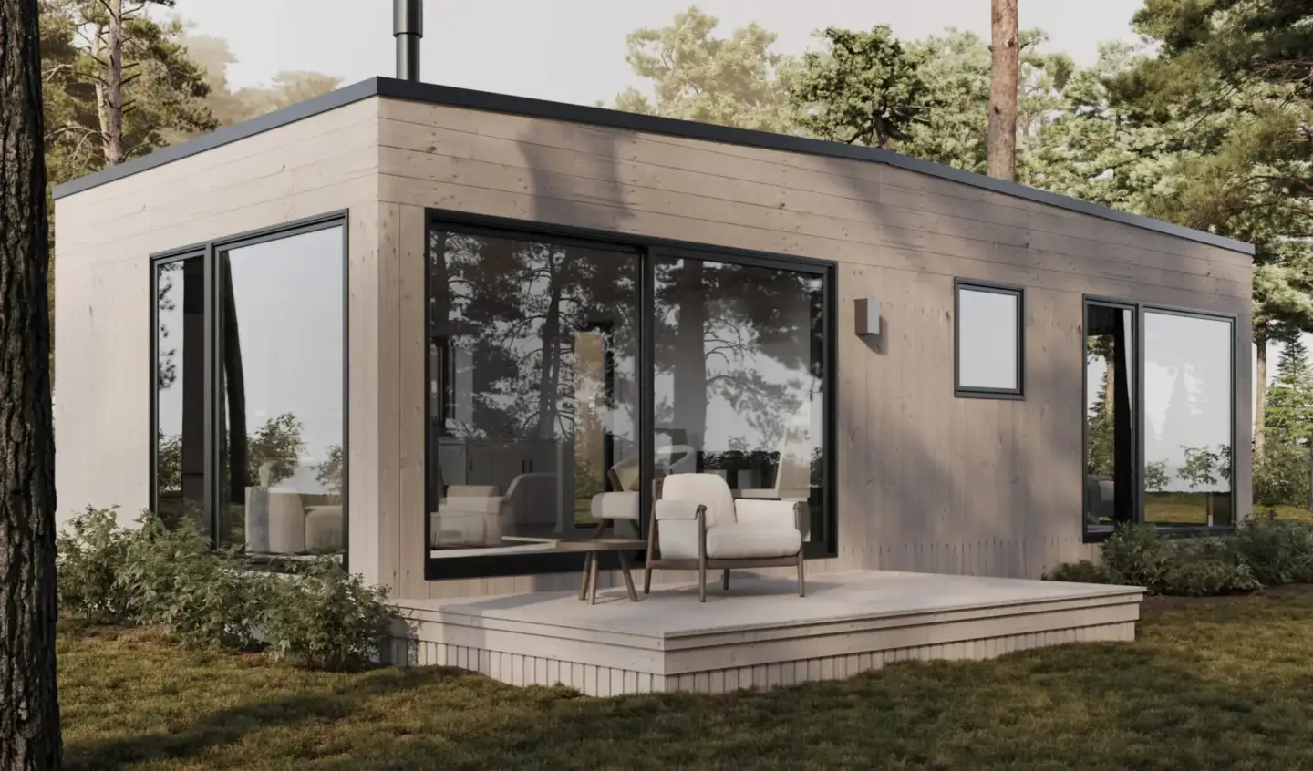 3D Rendering Pricing Guide: How Much Do 3D Renderings Cost in 2026 Compact modern house in a wooded setting with deck, house rendering cost reference