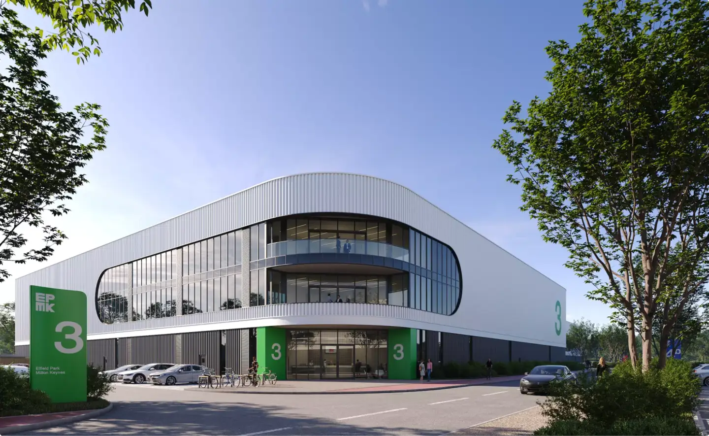 What Is Green Architecture? Meaning, Principles, and Examples Curved modern office building with green signage, trees, bikes, and glass facade