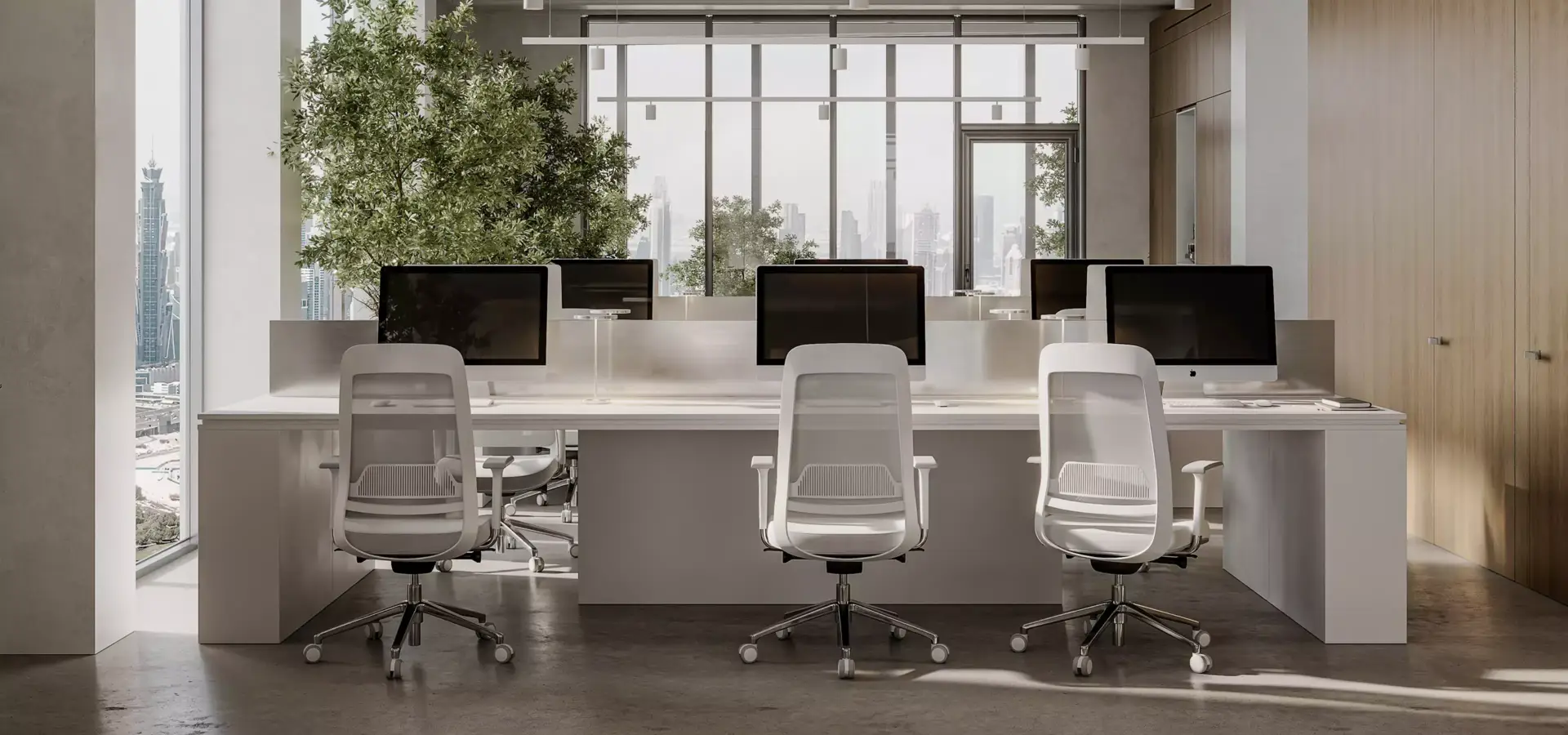 3D Office animation of a shared desk area with white chairs, desktop monitors, and tall city-view windows