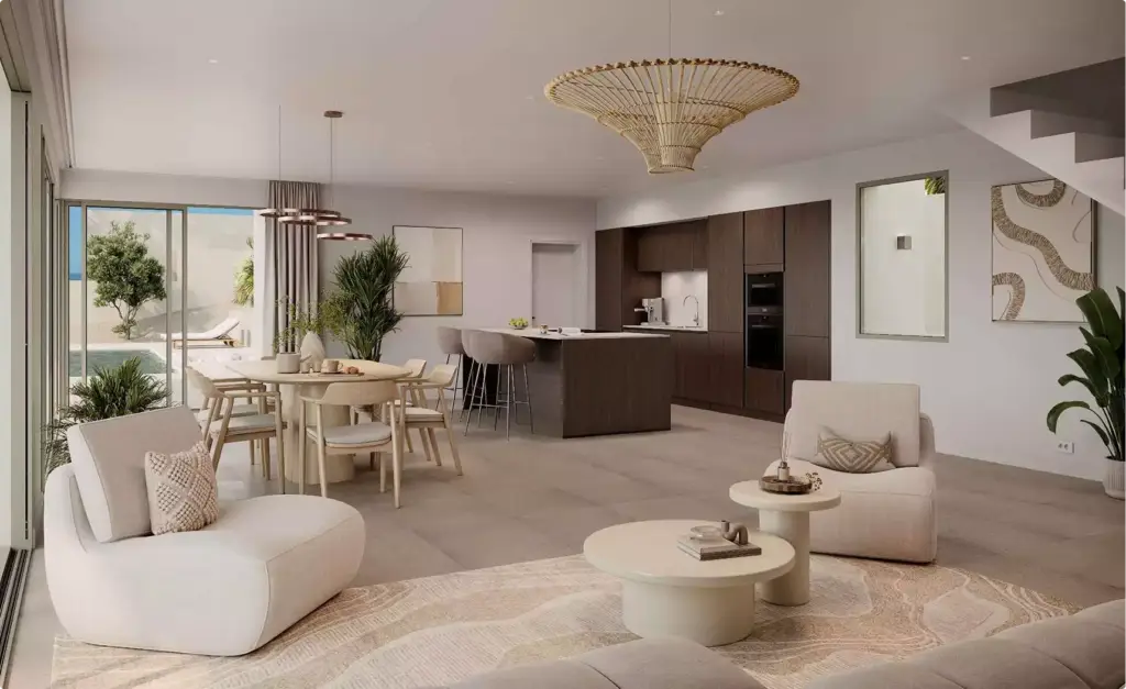 Open-plan living room and kitchen, residential rendering services, with neutral decor and chandelier