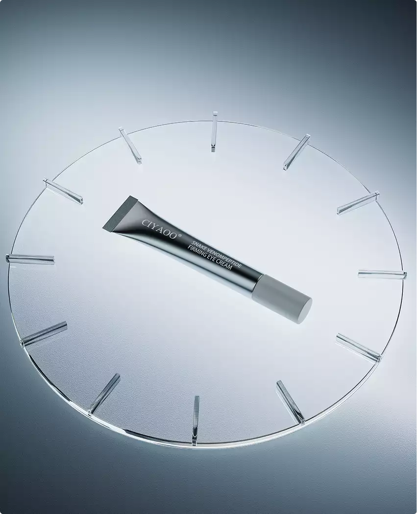 3D cosmetic eye cream tube centered on circular transparent platform with minimal geometric design