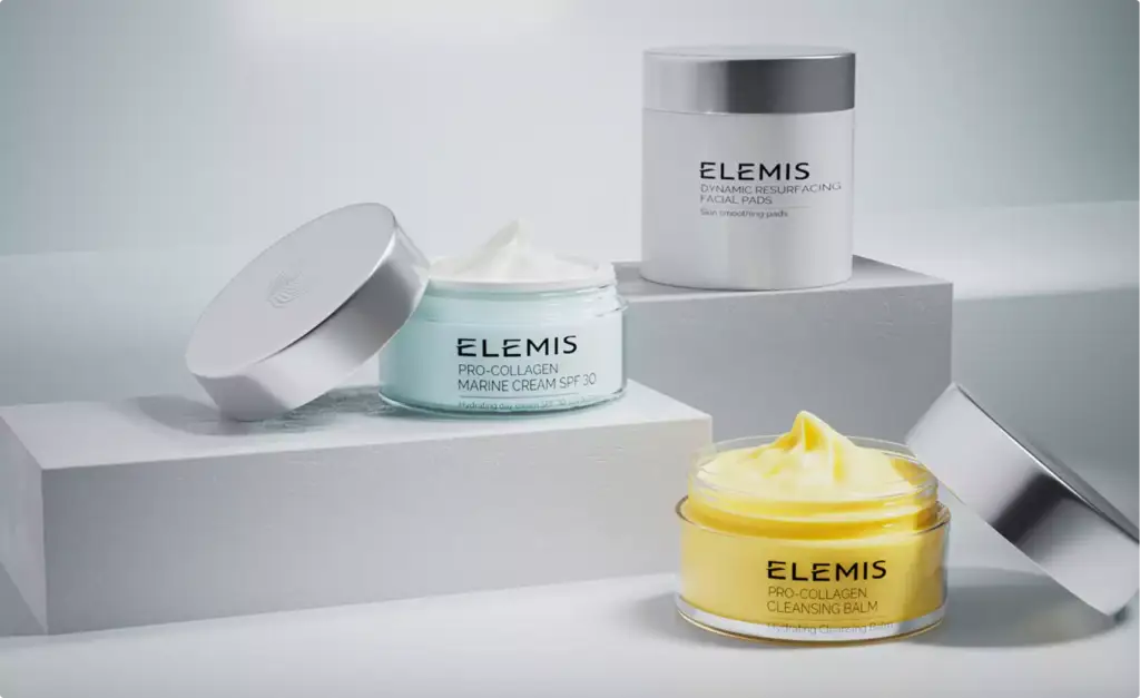 3D cosmetic skincare jars on white blocks with cream textures and lids displayed in minimal studio setting