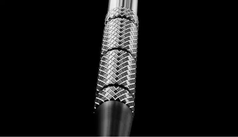 Dental implant texture in 3D medical animation video on black background with patterned grip detail