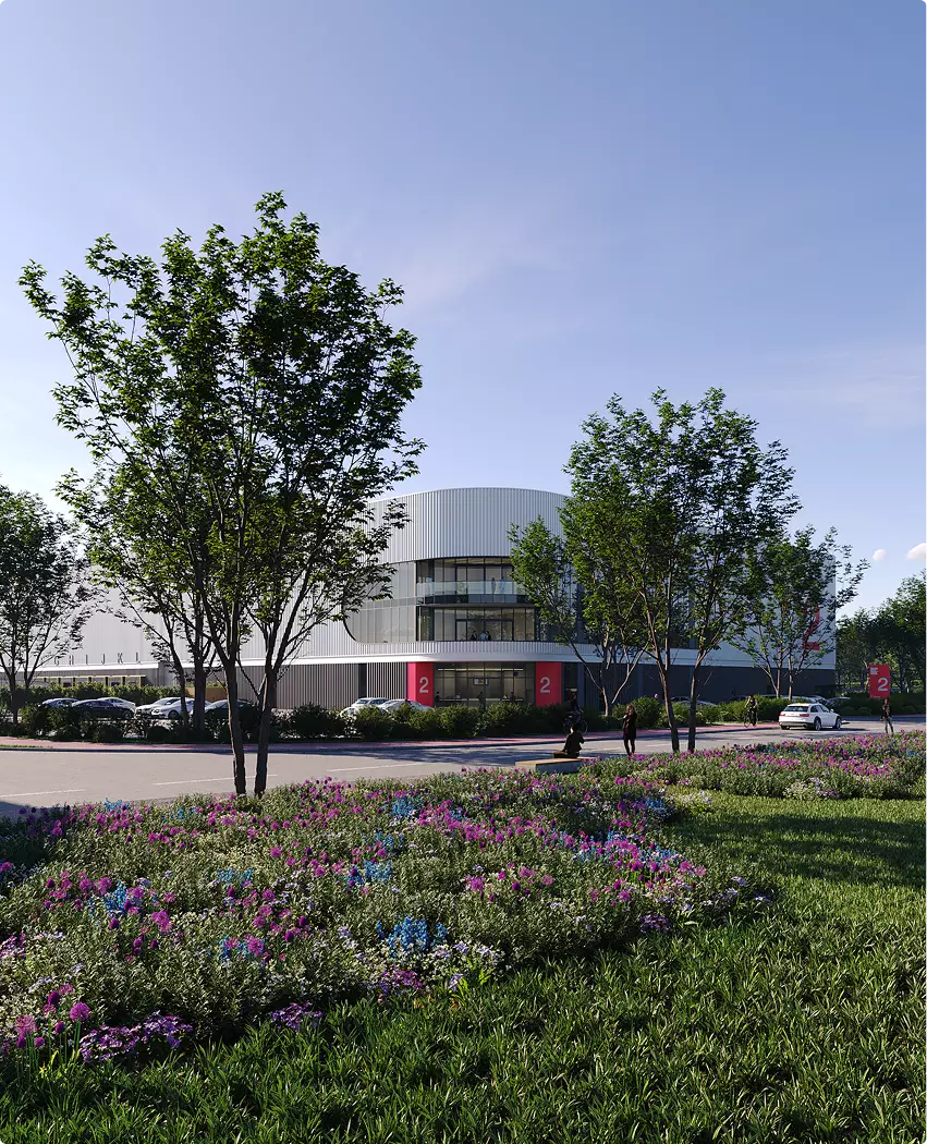 Aerial rendering of logistics center with landscaped flowers, trees, and modern warehouse facade