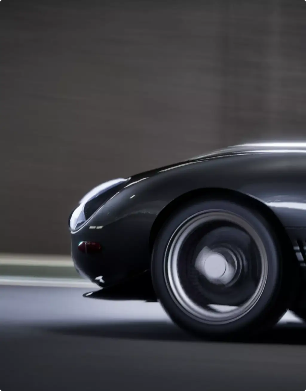 Black sports car wheel and front fender in tunnel motion, Automotive Rendering Service