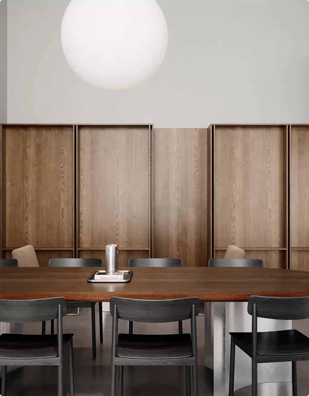 Commercial 3D rendering portfolio of a minimalist dining area with dark wood table and pendant light