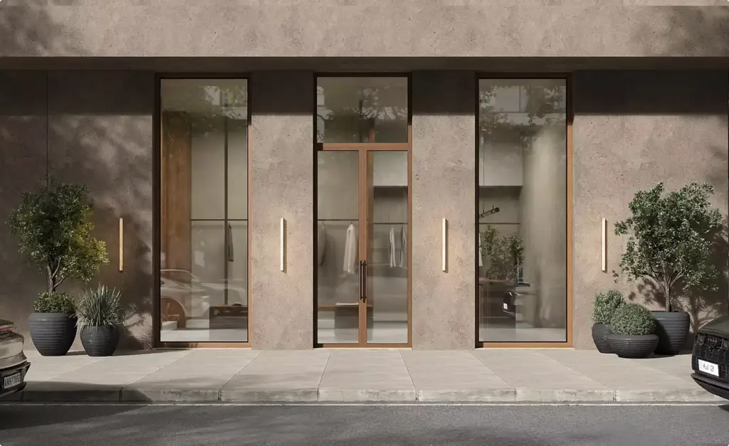 Commercial exterior rendering with storefront windows, central glass door, and clean modern facade