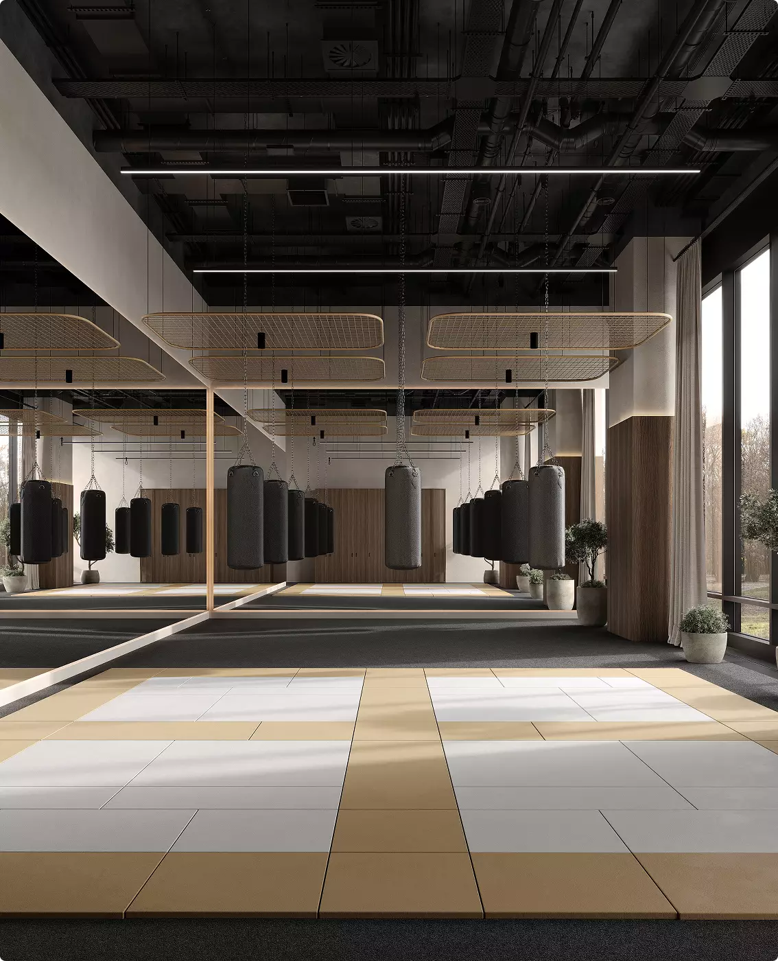 Boxing studio commercial gym design with punching bags, mats, mirrors, and modern lighting
