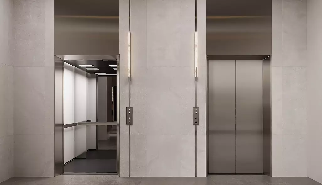 Elevator lobby fitness club interior design with metal doors, wall lights, and clean minimal surfaces