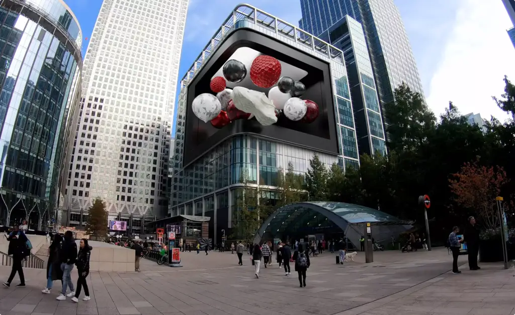 FOOH and CGI Advertising 3D spheres displayed on a giant digital billboard in a business district