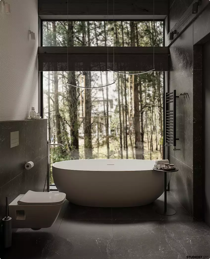 Modern forest house exterior bathroom with freestanding tub and tall window overlooking forest landscape