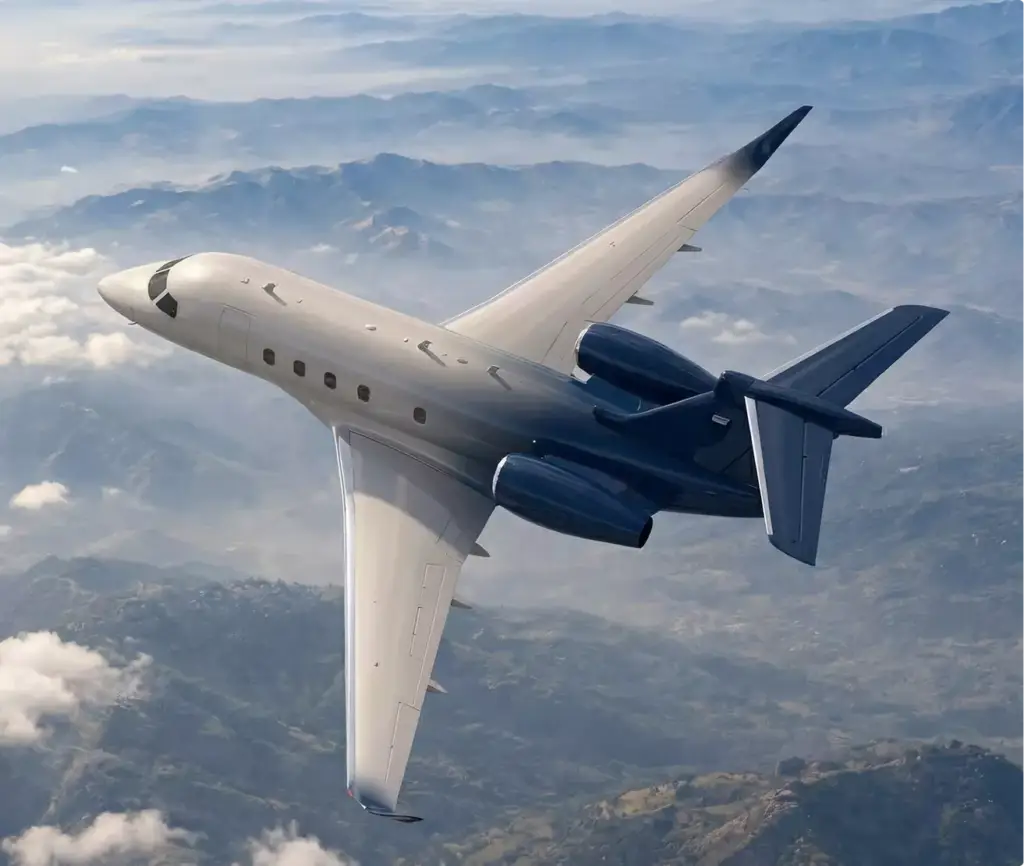Gulfstream G450 aircraft design jet banking above clouds with mountains below and twin rear engines visible
