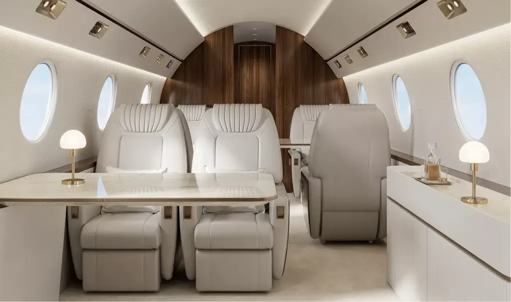 Gulfstream G450 airplane interior design cabin with leather seats table oval windows and soft lighting