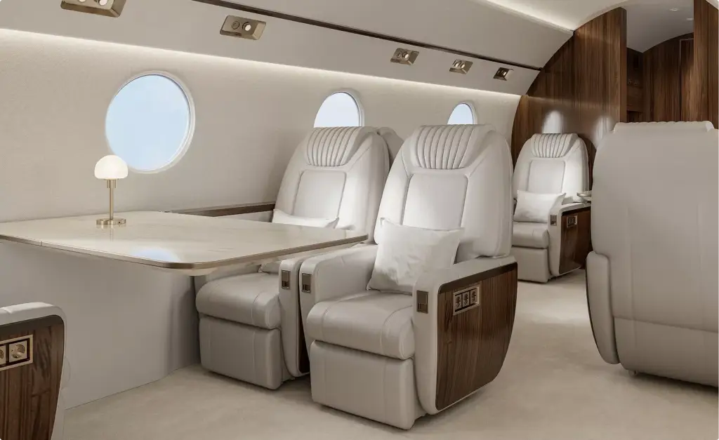Gulfstream G450 new aircraft design cabin interior with leather seats table and oval windows