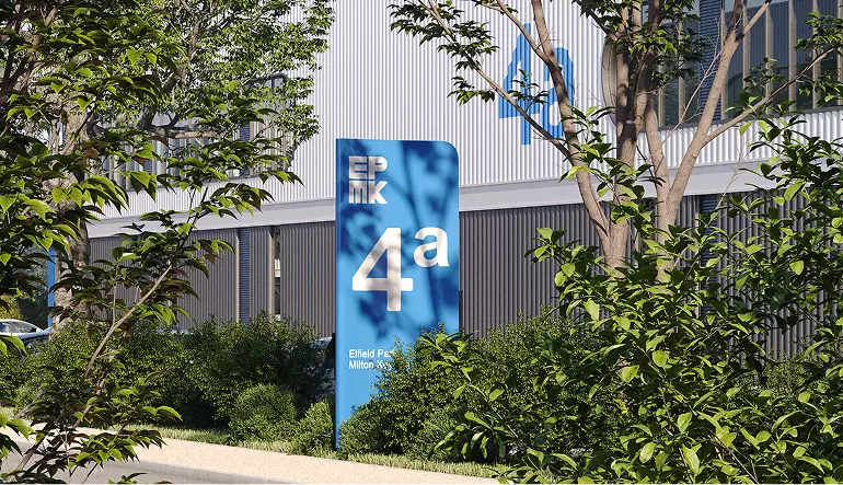 Industrial 3D rendering of building signage 4a with trees and modern warehouse facade in background