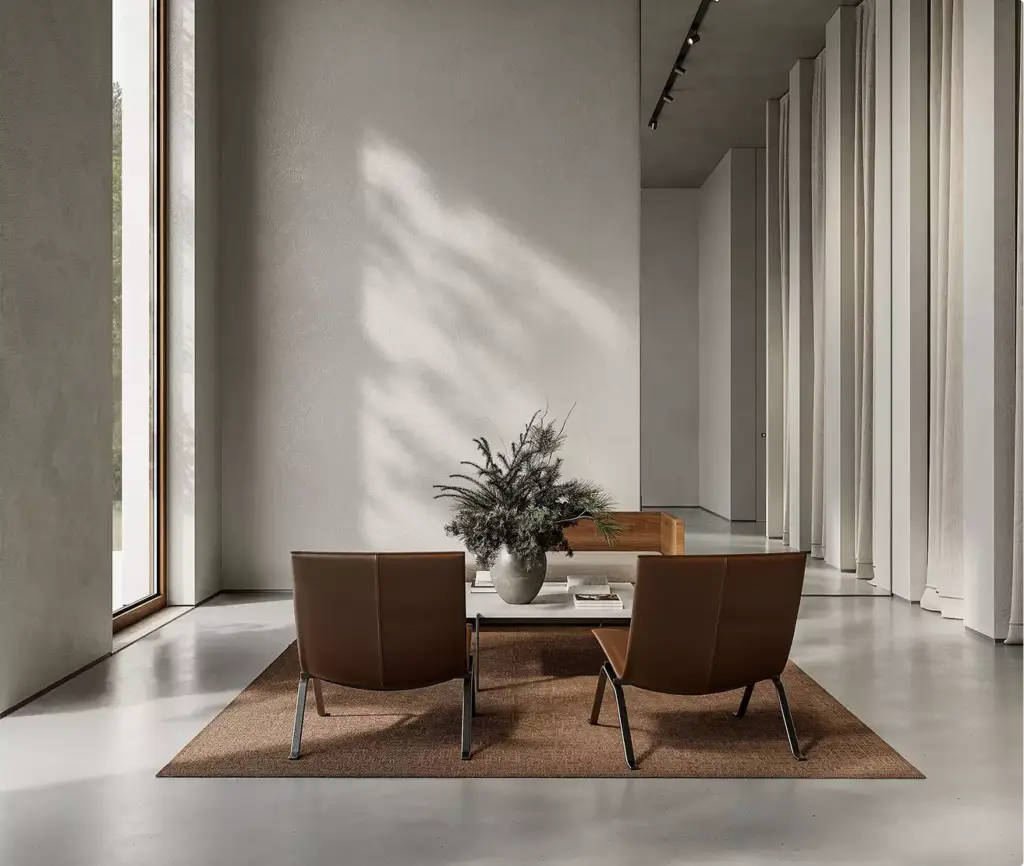 Retail store 3D rendering with lounge area, chairs, table, and minimalist interior with natural light