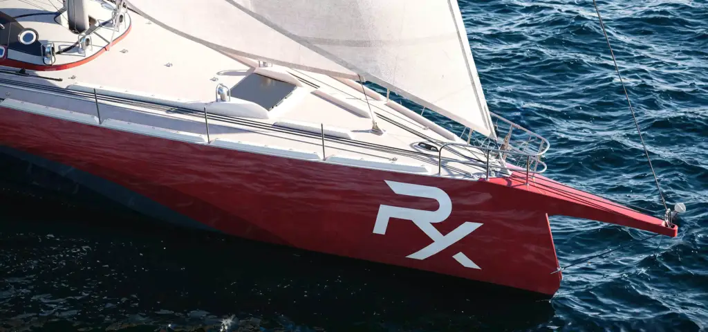 Sailboat 3D rendering close view of red bow and white sail over rippled ocean surface