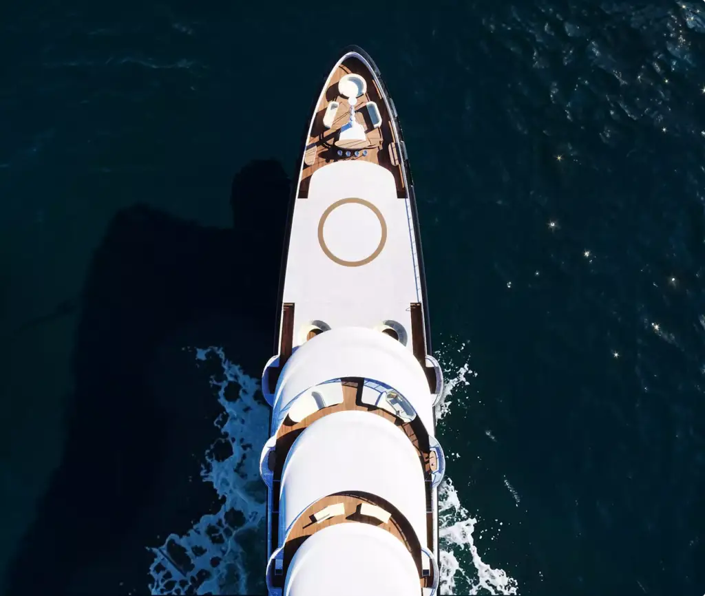 3D yacht visualization with top down aerial view of a yacht moving across dark ocean water