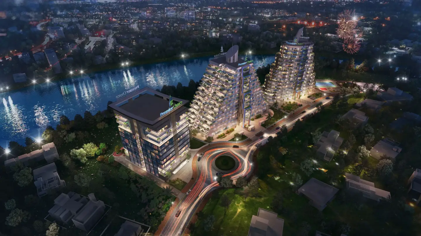 Best 3D Rendering Companies in Abu Dhabi for Real Estate & Architecture Night aerial of illuminated residential towers by river and roundabout, Best 3D Rendering Companies in Abu Dhabi for Real Estate & Architecture