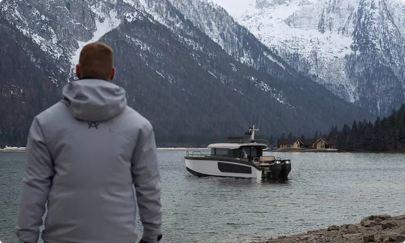 Boat hero image on lake with person viewing from shore and mountains in background