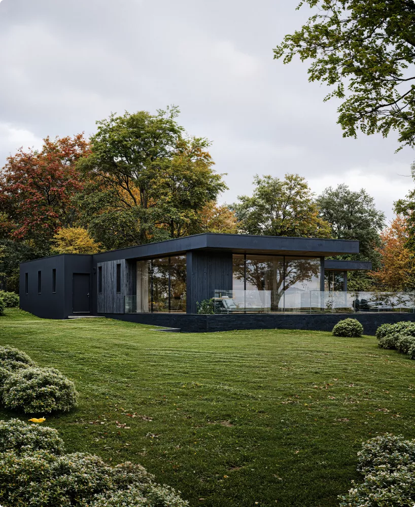 Modern house hero image with glass walls and large lawn surrounded by trees