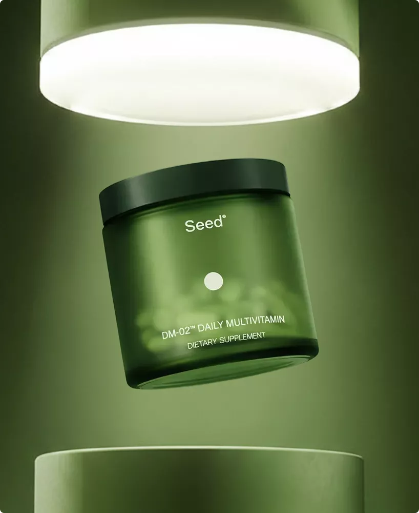 Supplement jar hero image floating under light with green container and label visible