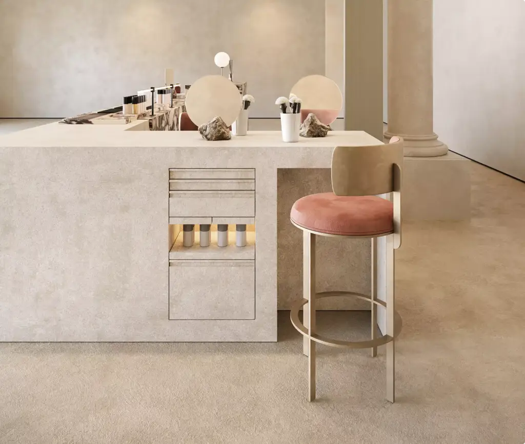 Sophisticated beauty consultation station with soft neutral materials, luxury seating, mirrors, and premium cosmetic storage.