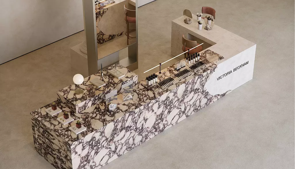 Premium beauty retail installation with marble textures, curated fragrance displays, and minimalist luxury interior design.