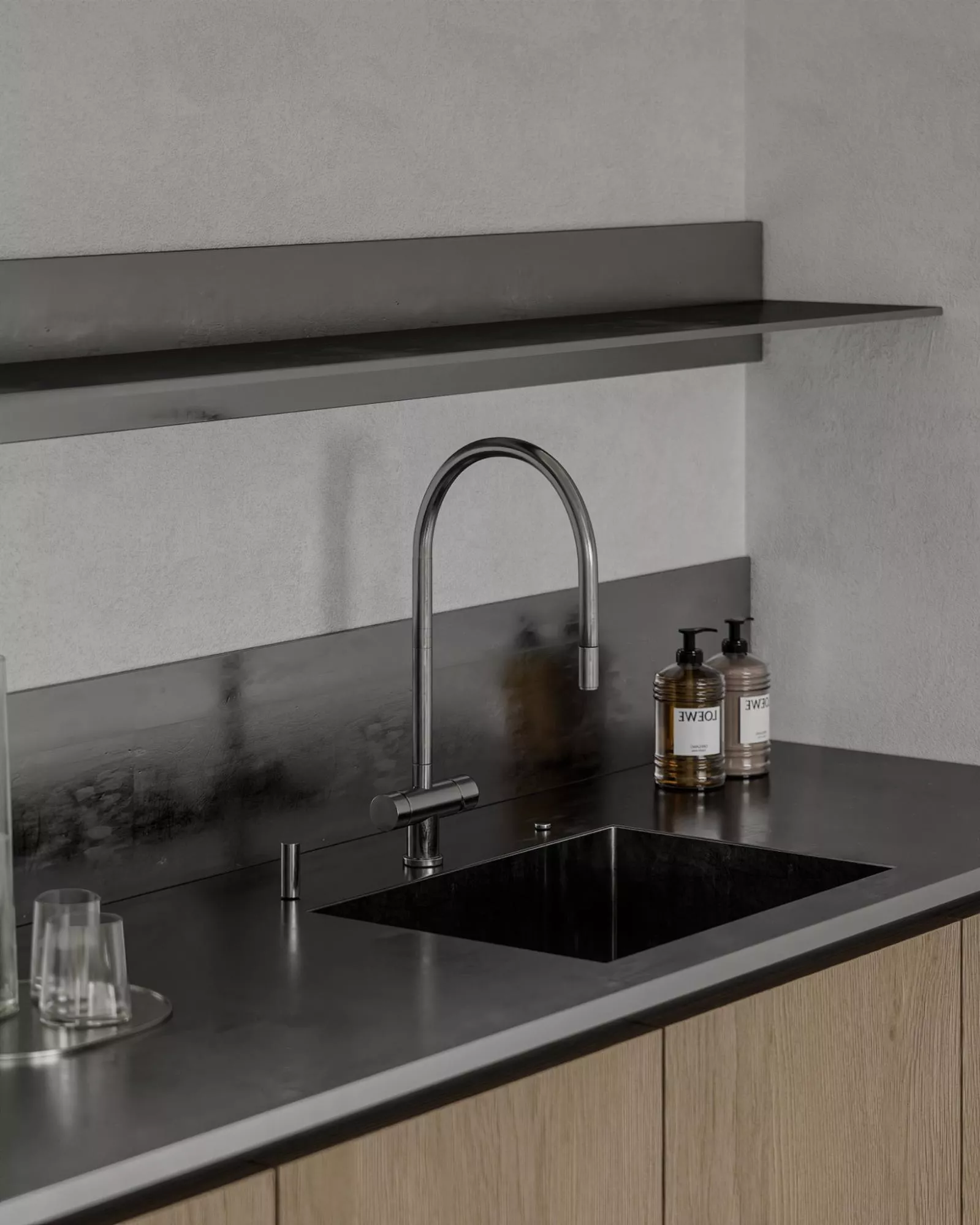 Kitchen Renders: Photorealistic 3D Examples, Techniques, and Agency Guide Minimal kitchen 3D visualization with black sink, steel faucet, and floating shelf