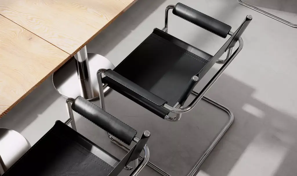 Photorealistic cafe 3D visualization with black leather chairs beside wood tables