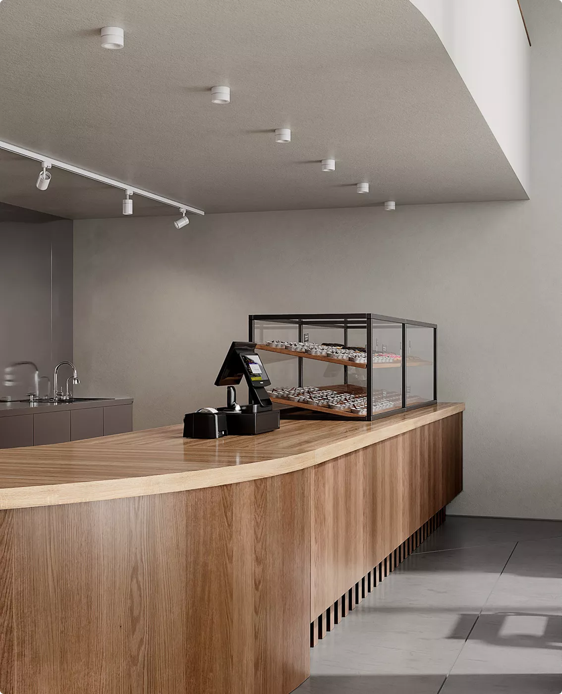 Photorealistic cafe 3D visualization with pastry case on curved wood service desk