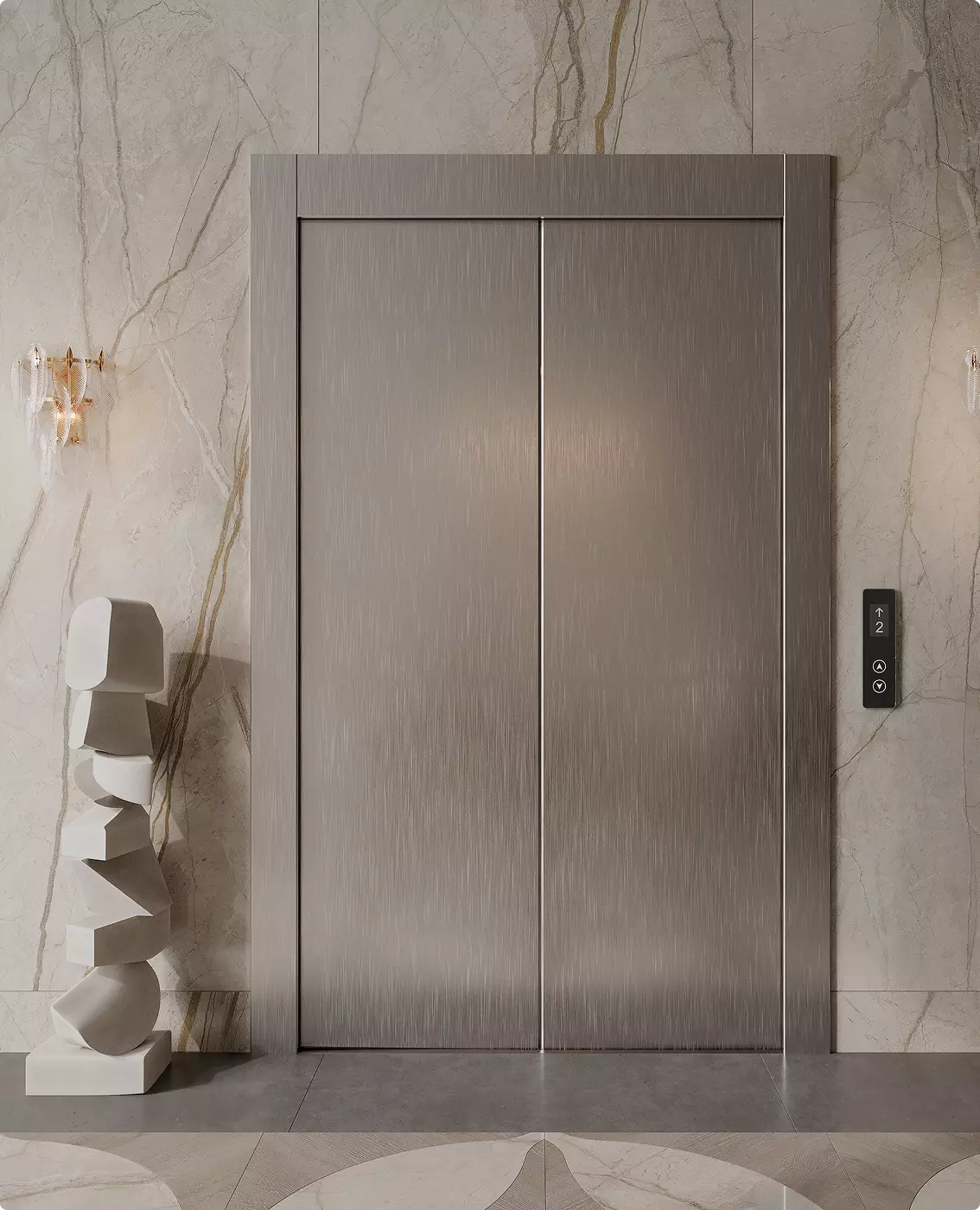 Luxury brushed metal elevator doors in a modern marble lobby interior with sophisticated architectural styling.