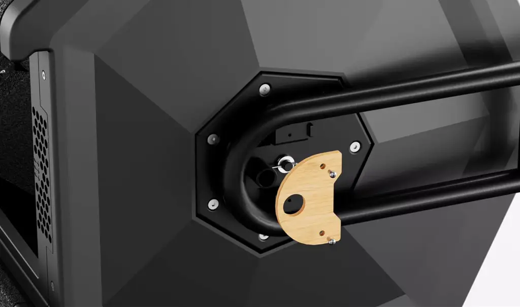 Close-up of the rotating handle attachment system on a smart composting device with sturdy industrial construction and ergonomic design.