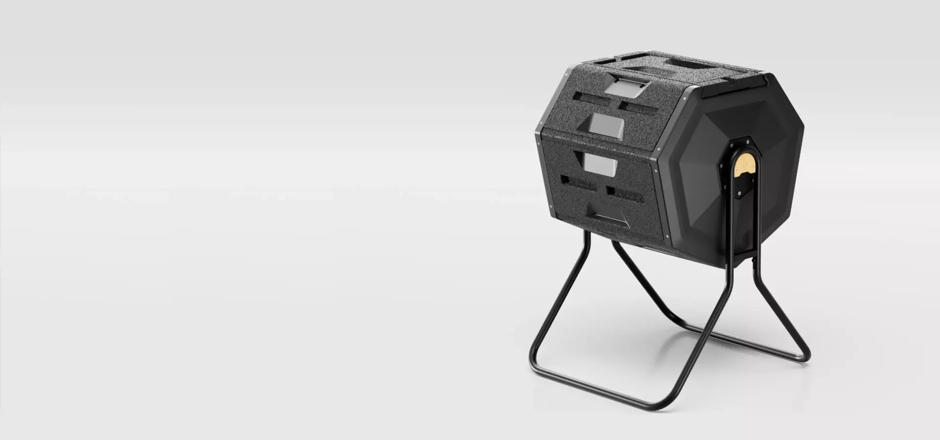 Modern smart composting device with elevated rotating drum and durable black modular construction for efficient organic waste composting.