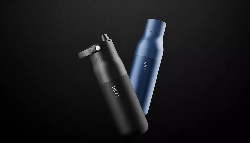 Smart water bottle CGI showing black and blue bottles floating against dark backdrop