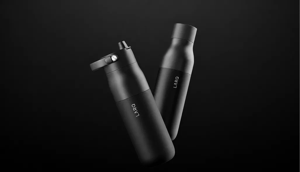 Smart water bottle CGI with black matte bottles floating on dark studio background