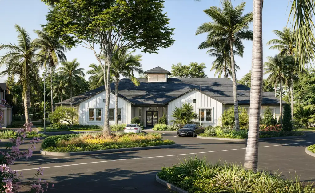 Tropical residential development CGI with clubhouse exterior, tropical landscaping, and curved driveway