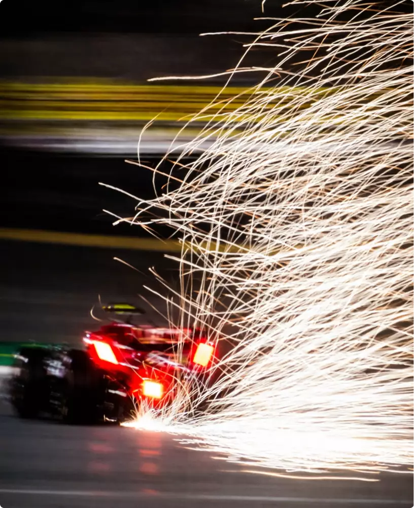 What Is Automotive CGI? A Guide to Car Rendering Automotive CGI lifestyle scene of a luxury car on a race track with sparks