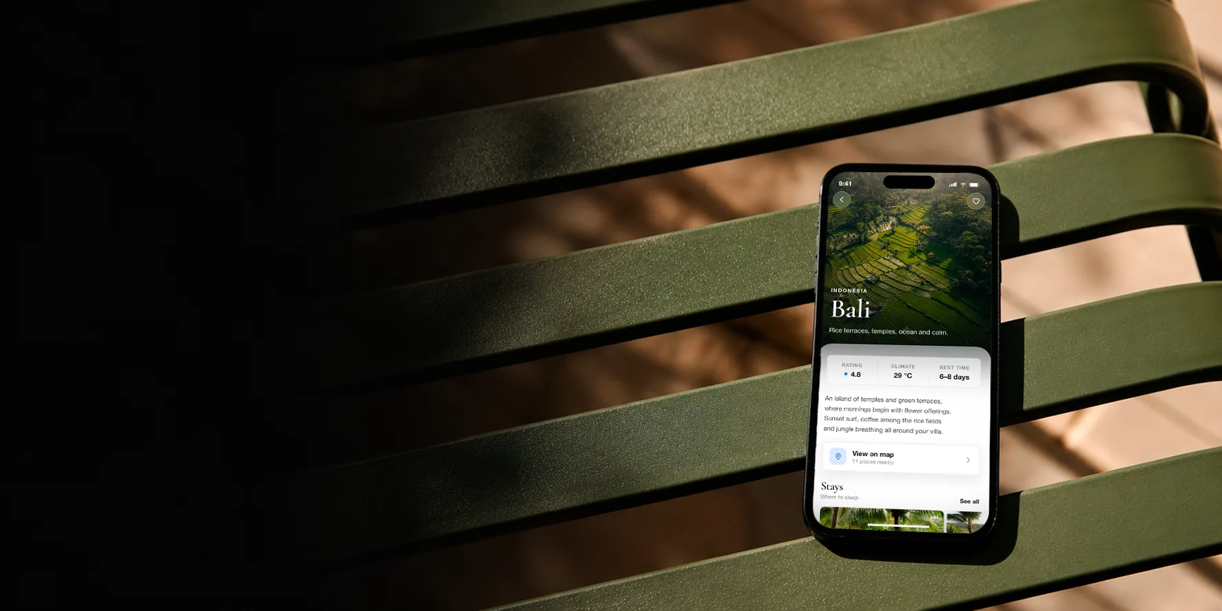 Escape travel app shown on a phone with a Bali destination guide screen
