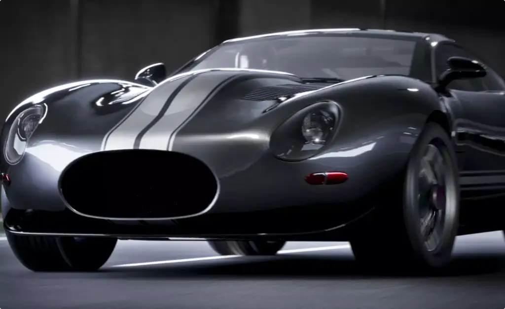 Jaguar-inspired custom car front view driving through a tunnel with racing stripes