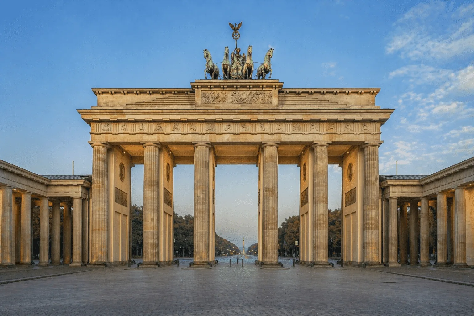 Neoclassical Architecture: An Expert Guide to the Classical Revival in Architectural History Neoclassical architecture triumphal gate with tall columns at sunset in Berlin