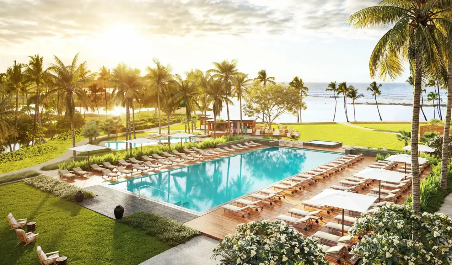 The Best 3D Rendering Companies in Mexico Beachfront resort pool at sunset — 3D architectural visualization for a coastal real-estate development.