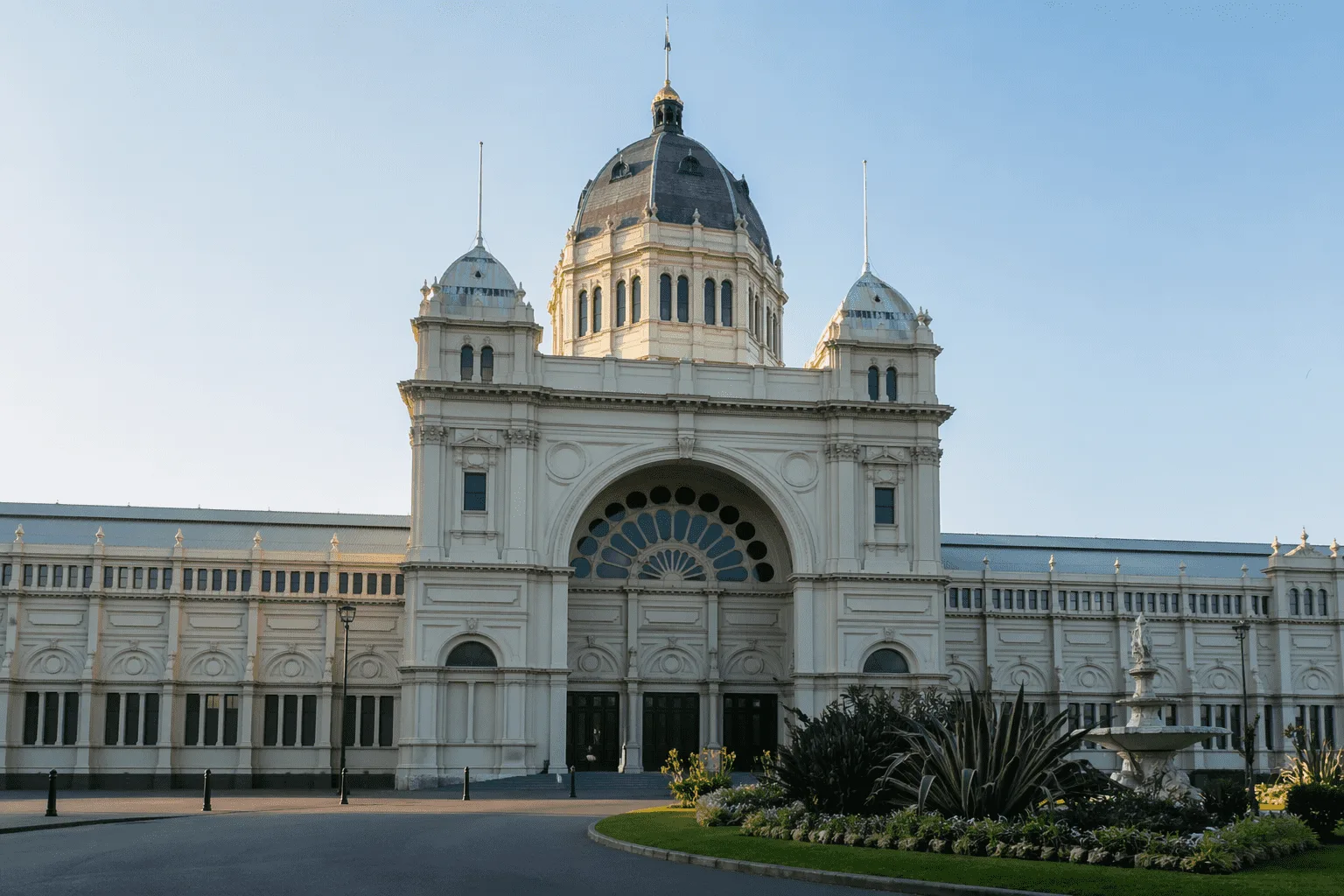 Victorian Architecture: A Complete Guide to Its History and Styles Government building with green domes, stone facade, and formal Victorian composition