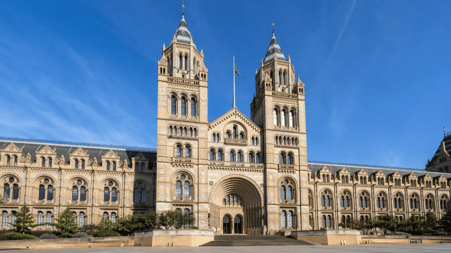 Victorian Architecture: A Complete Guide to Its History and Styles Natural History Museum facade in London with twin towers and Romanesque arches